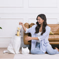 Load image into Gallery viewer, Lily White Decor in Living Room - Lily in matte white displayed in a stylish living room setting.  - Abstract Home Art
