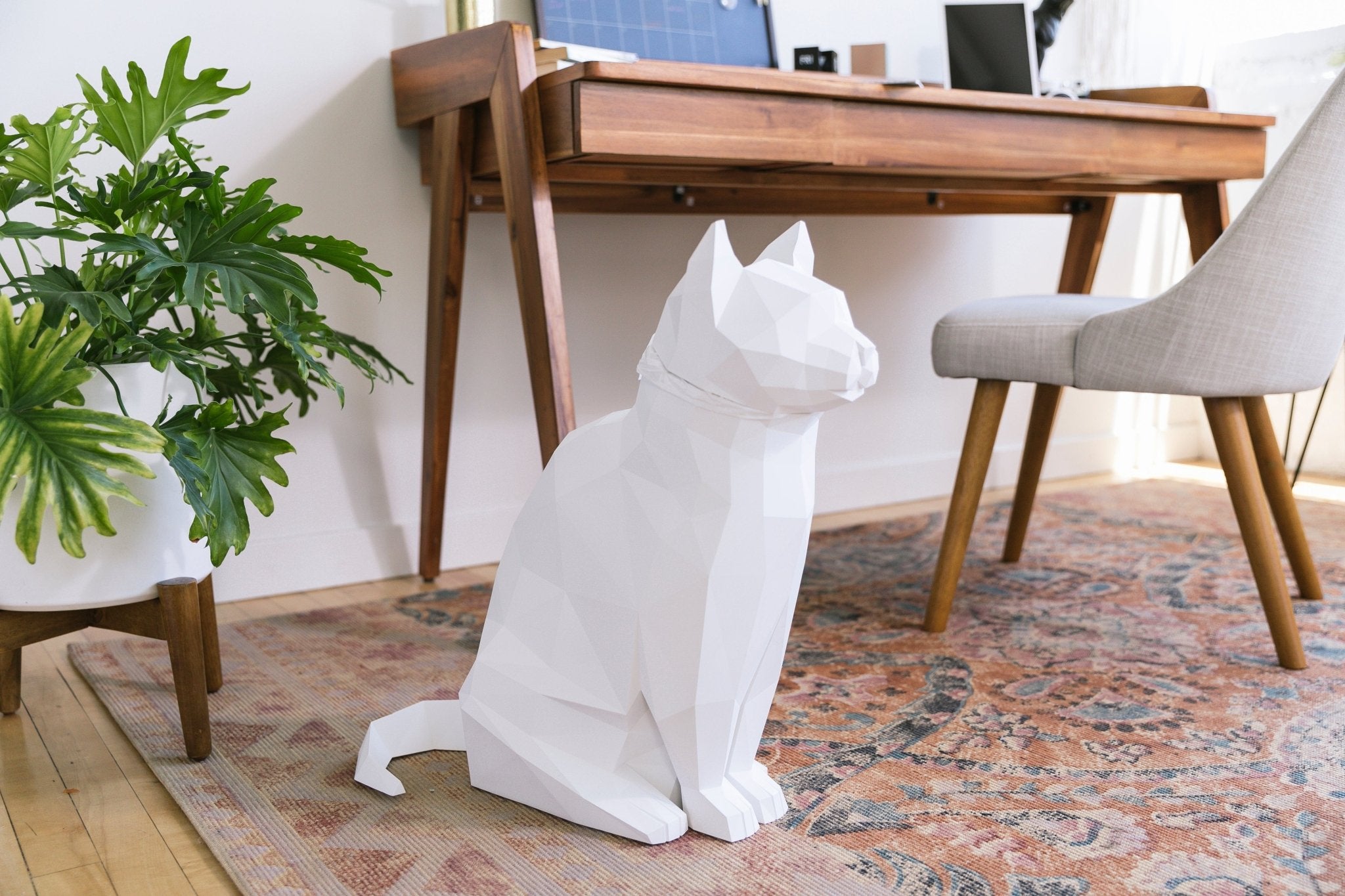Lily White Cat Side View - Side profile of Lily in matte white, showcasing its modern design.  - Abstract Home Art